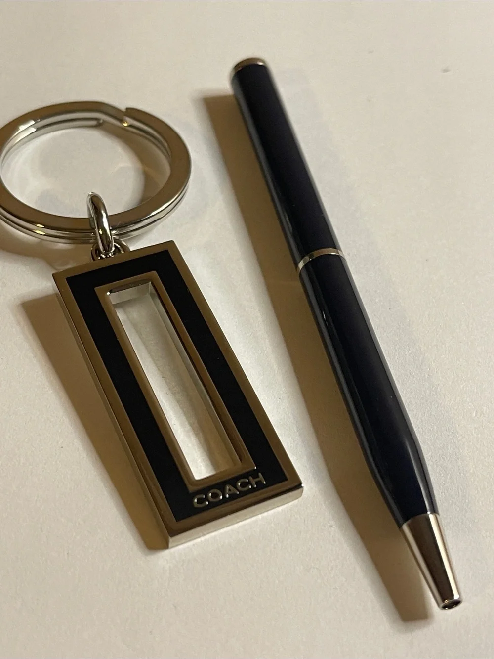 Coach Black and Silver Rectangular Keychain and Coach Pen